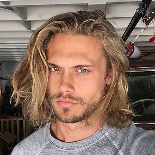 Man with a flow cut hairstyle